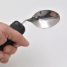 Spoon with swivel feature and contoured handle